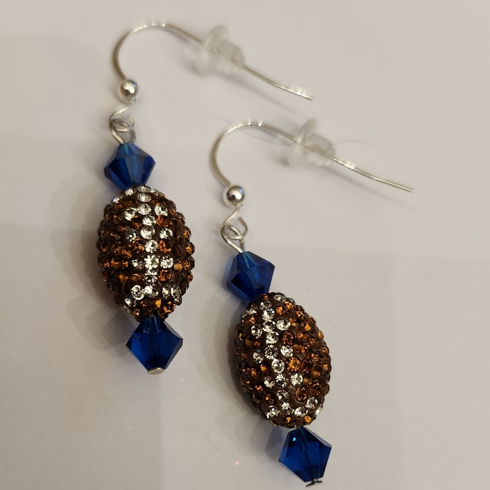 Brand new, handmade rhinestone football earrings